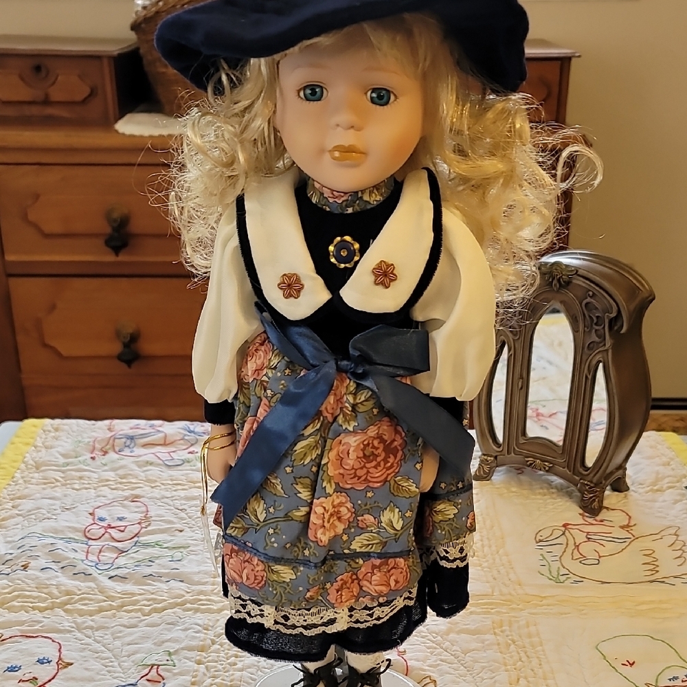 Elegant Handmade Porcelain Doll with Blue and White Dress